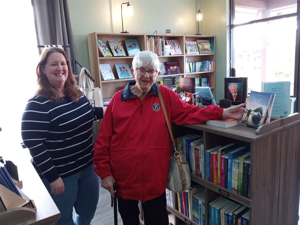 Judith with her book in the bookstore