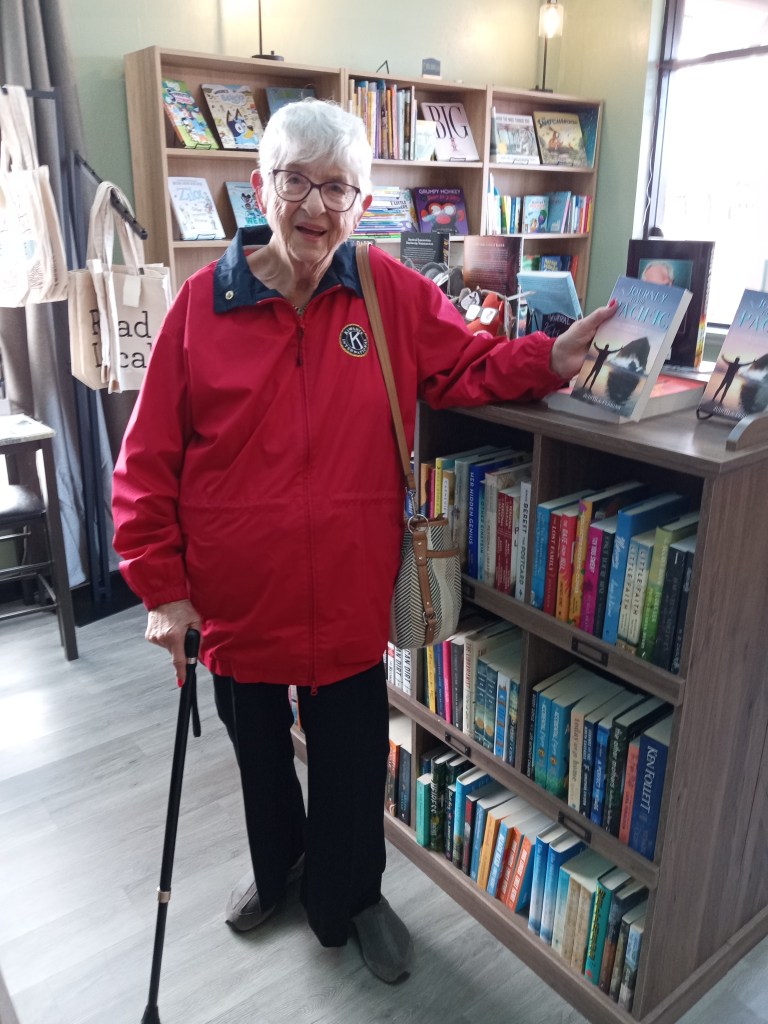 Judith with the owner of the bookstore